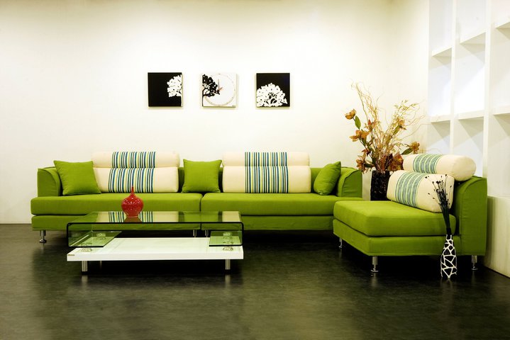 interior-design-style-design-sofa-green-pillows-vases-table-painting-house-lounge.jpg